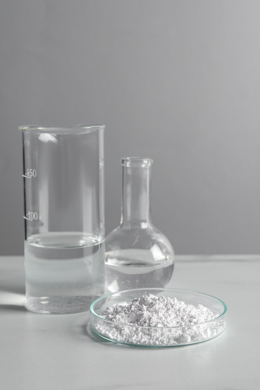 Petri Dish with Calcium Carbonate Powder and Laboratory Glasswar